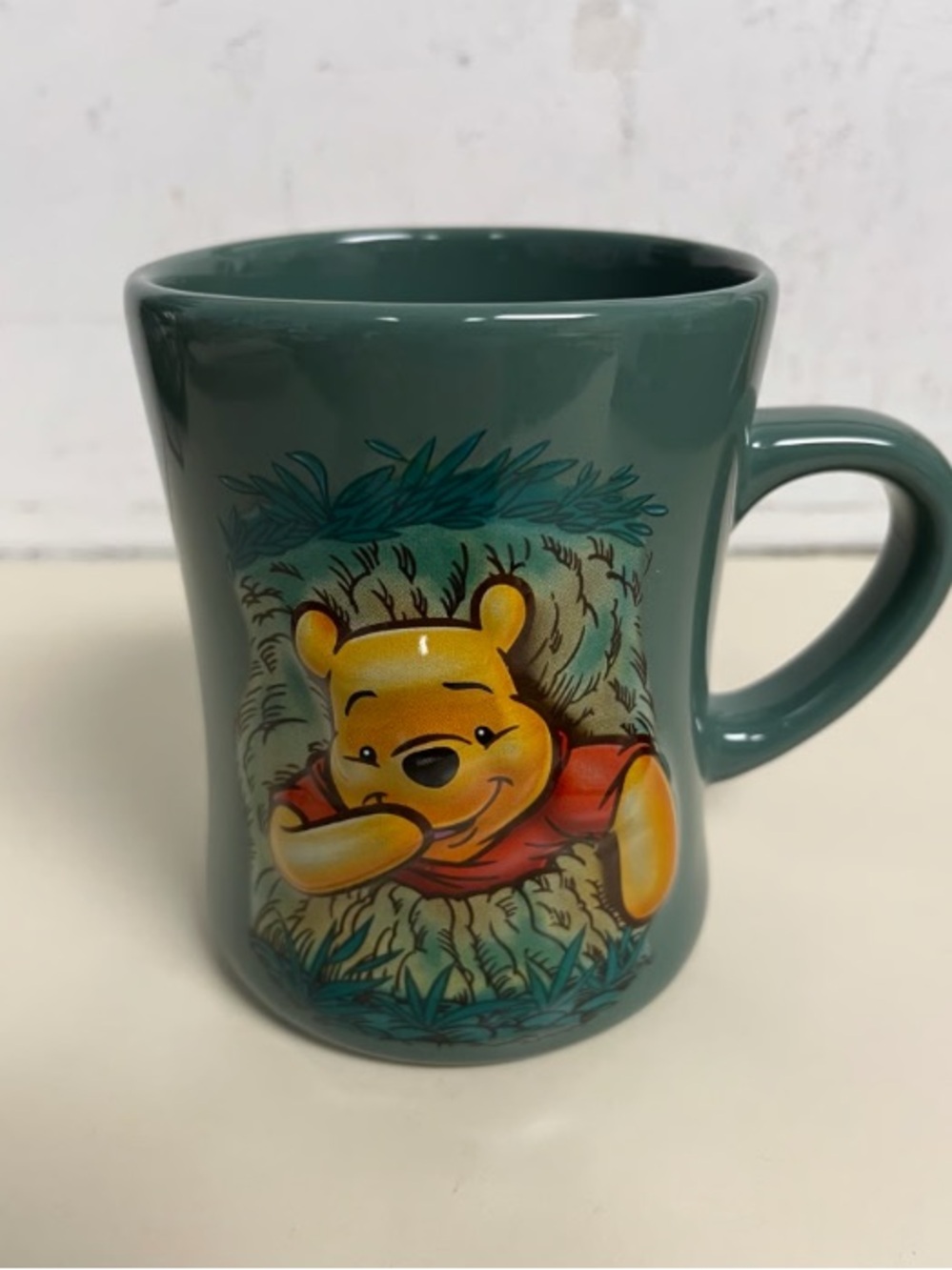 Green Ceramic Mug with Winnie the Pooh Illustration